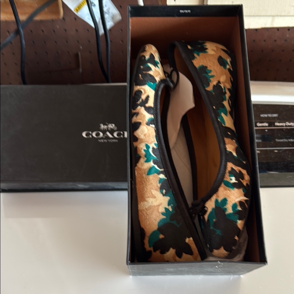 Coach Black and Tan Flats with Modern Design